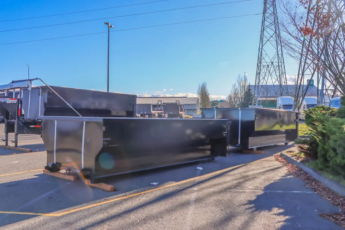 Roll-off dumpster ready for waste disposal at job site for Yard Waste Dumpster Rental in Vancouver